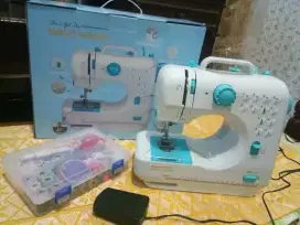 Mesin Jahit Portable Magic Hands 2