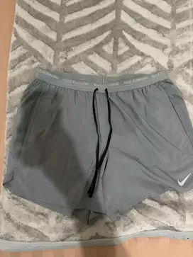 Celana running pria nike
