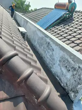 Tukang bangunan,perbaikan atap bocor,dag,talang,kanopi,renopasi