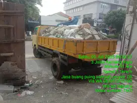 Tukang buang puing sampah dll
