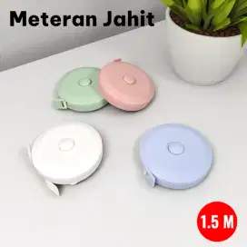Meteran kain dengan gulung otomatis