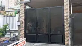 pagar rumah lipat  bahan plat perforated warna hitam