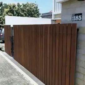Pagar besi gerbang rumah grc minimalis dengan pintu yang berkualitas