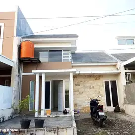Di kontrakan rumah perumahan sathya grand City gresik