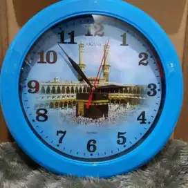 Jam dinding kaligrafi
merk ogana