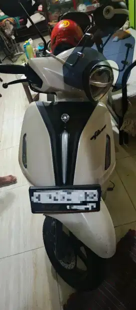Grand Filano putih pajak panjang plat pusat