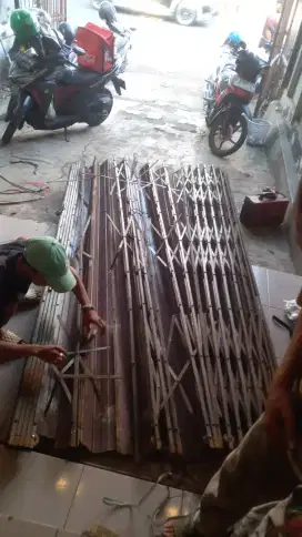 Tukang benerin pintu rolling door folding gate murah