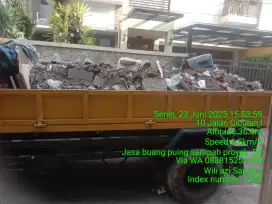 Tukang buang puing sampah dll