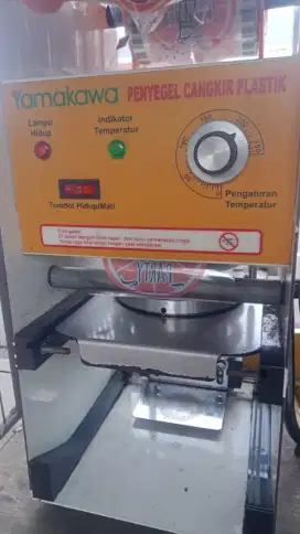 Cup sealer mesin pres