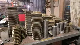 Pully kuningan dan baja