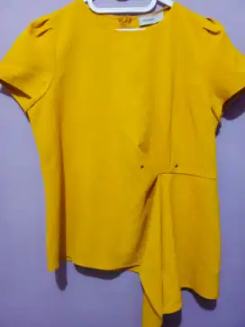 Blouse wanita model pita