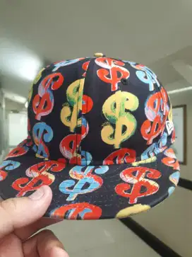 Topi New Era x Andy Warhol AOP Full Print Dollar Logo