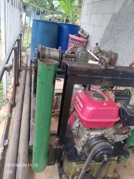 Tukang sumur bor dalem
