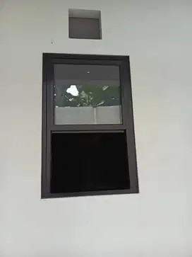 Jendela Sliding Vertikal Aluminium – Minimalis & Hemat Tempat