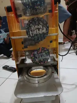 Sealer tutup cup es teh solo
