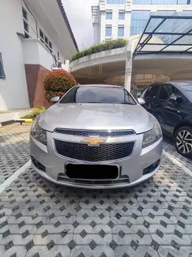 DIJUAL MOBIL CHEVROLET CRUZE 1.8L A/T 2010 – SILVER METALIK