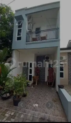 Rumah bagus 2 lt dlm cluster dekat sekali ke jalan 2 mobil di condet