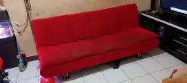 Sofabed merah bekas