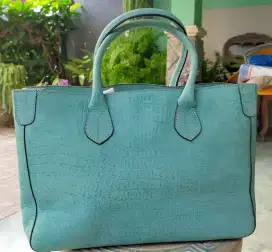 Tas fashion wanita, kulit