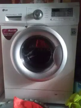 Mesin cuci merk LG 1 pintu 7kg barangnya masih bagus normal