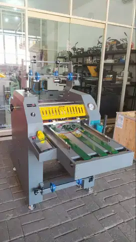 MESIN LAMINASI THERMAL AUTO CUT HIDROLIS 410 & 520 ALC (AUTO LINE CUT)