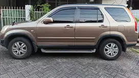 Honda CR-V 2004 Gen 2 - Bensin - Coklat Muda Metalic - Manual
