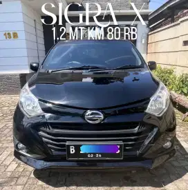Sigra x 1.200 manual km rendah