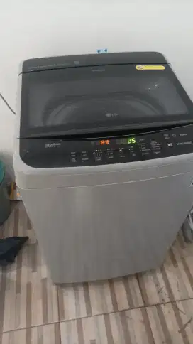 SERVIS MESIN CUCI