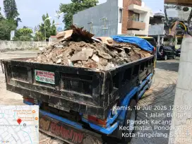 Buang sampah dan puing bangunan