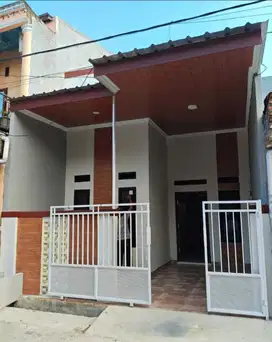 Rumah Coklat Minimalis Modern Nyaman di Pondok Ungu Permai Sektor V