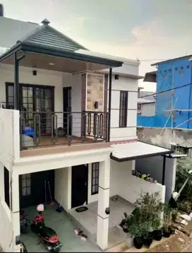 “Rumah Bali Modern, 10 Menit ke LRT! Lokasi Strategis, Desain Eksotis!