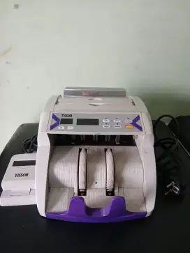 Alat penghitung uang tissor
