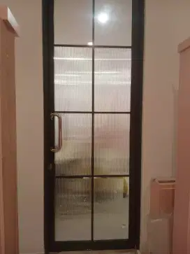 Jasa pasang kaca film gedung dan ruko