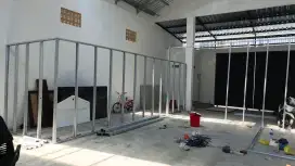 pak tukang renovasi bangunan