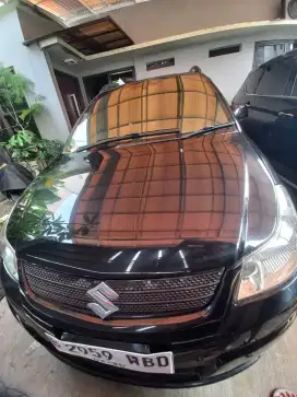 Suzuki SX 4 cross over matic, Hitam metalik,t.2010