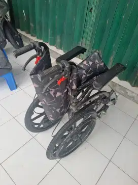 Kursi roda traveling