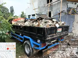 Jasa buang puing dan pengurugan puing
