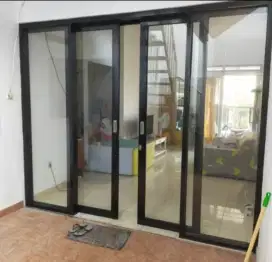 Pintu sliding 2 daun gandeng kaca mati kanan kiri