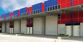 Gudang baru depan tol pik 2 ijin indrustri