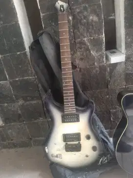 Gitar listrik patah atas nego bebas