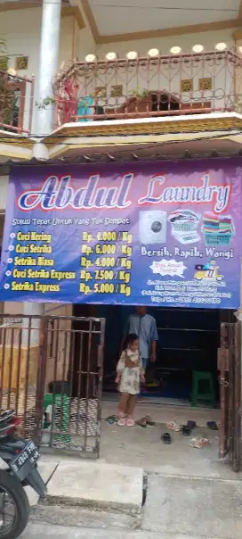 Over kontrak usaha laundry
