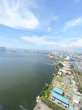 dijual 2 kamar kondominium greenbay unfurnished harga BU!