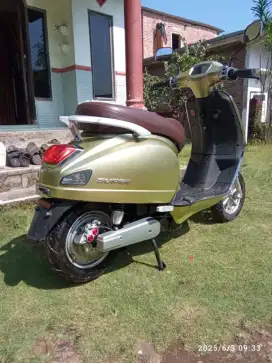 Vespa listrik T3 doble cakram