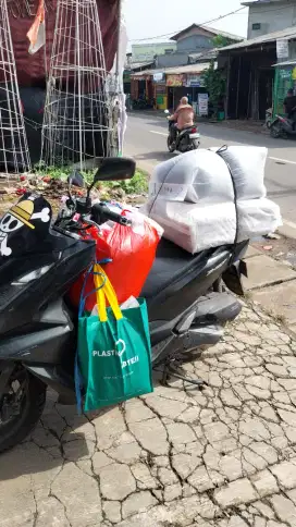 lowongan kurir laundry