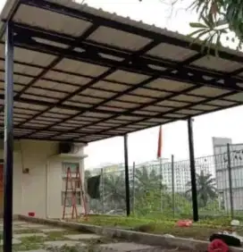Pemasangan kanopi baja dan hollow