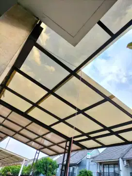 Kanopi terpasang atap solar plet