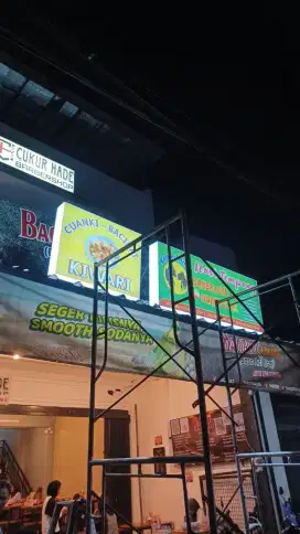 Plang nama huruf timbul