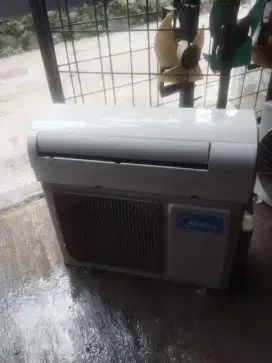 Ac midea 1/2 pk dingin