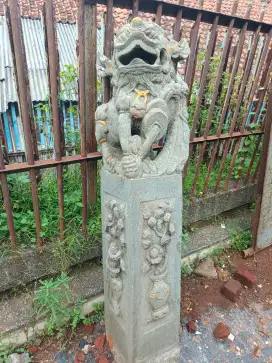 Patung batu kilin singa
