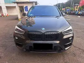 BMW X1 X-1 1.5 sDrive 1.8i  xLine 2016 Nonpano  Coklat Full Rekord